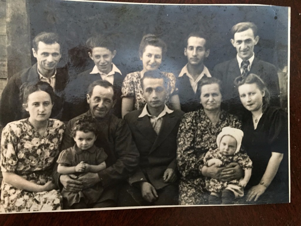 Tolpin family photo. 1948?, Standing: Leva, .., Tania, Grisha, Isaak, Sitting: Mina, Rita, Joseph, Misha, Entsia, Larisa, Gnesia