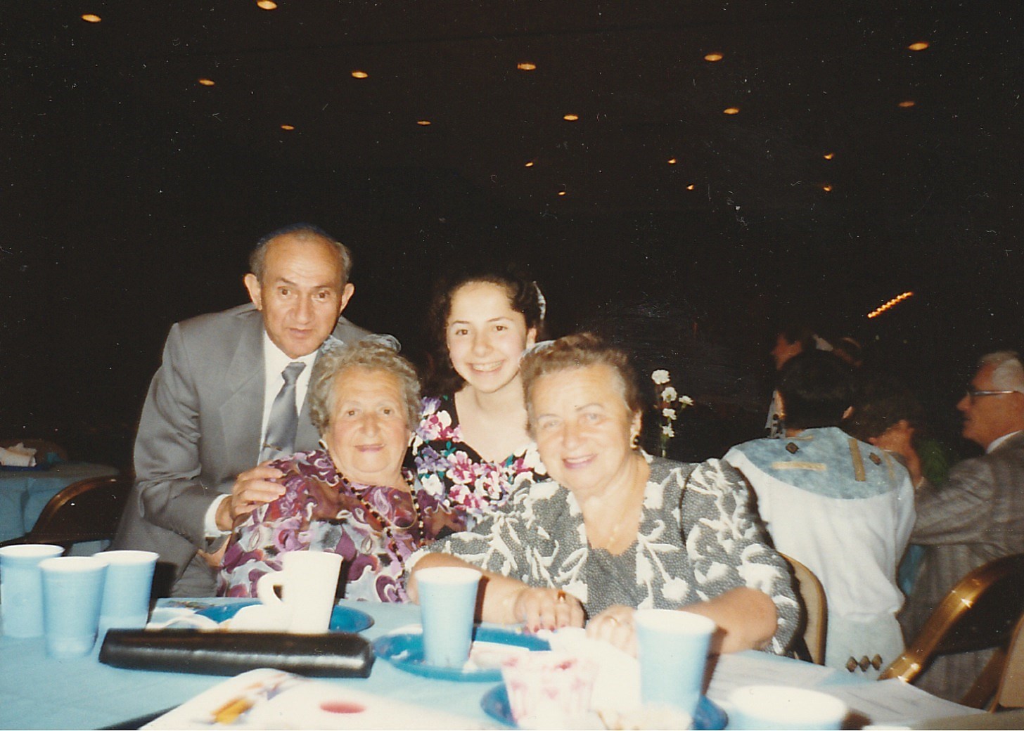 Lena's Hebrew school graduation, Standing: Isaak, Lena, Sitting: Tania, Gnesia